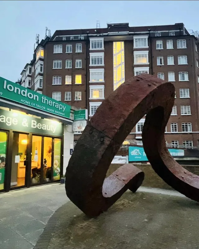 Thai London Therapy Marylebone storefront at 60 Rossmore Road beside the public sculpture